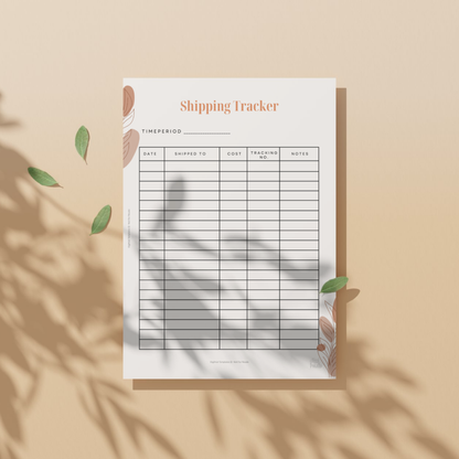 Shipping tracker sheet on a beige background with leaf shadows