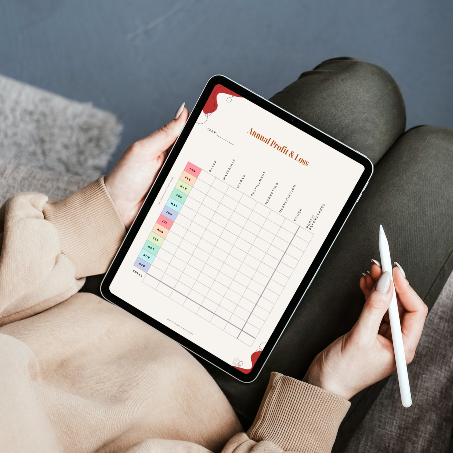Person holding a tablet with a financial app on a dark surface